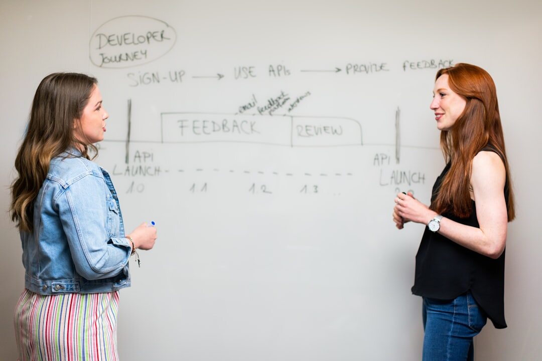 woman explaining idea to friend